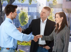 Businesspeople Meeting Outside Of Office